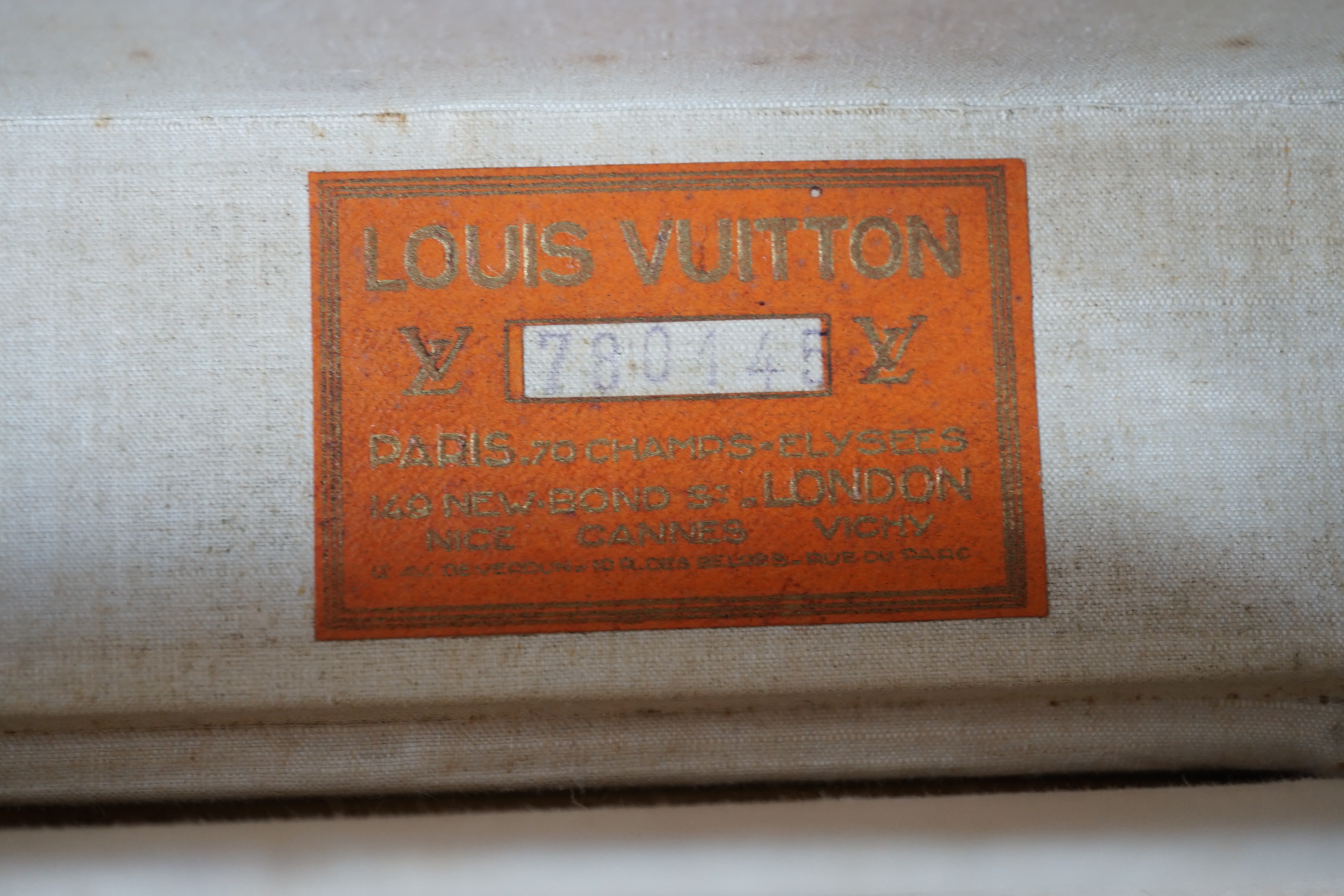 A vintage Louis Vuitton monogram canvas suitcase, 71cm x 44cm x 22cm